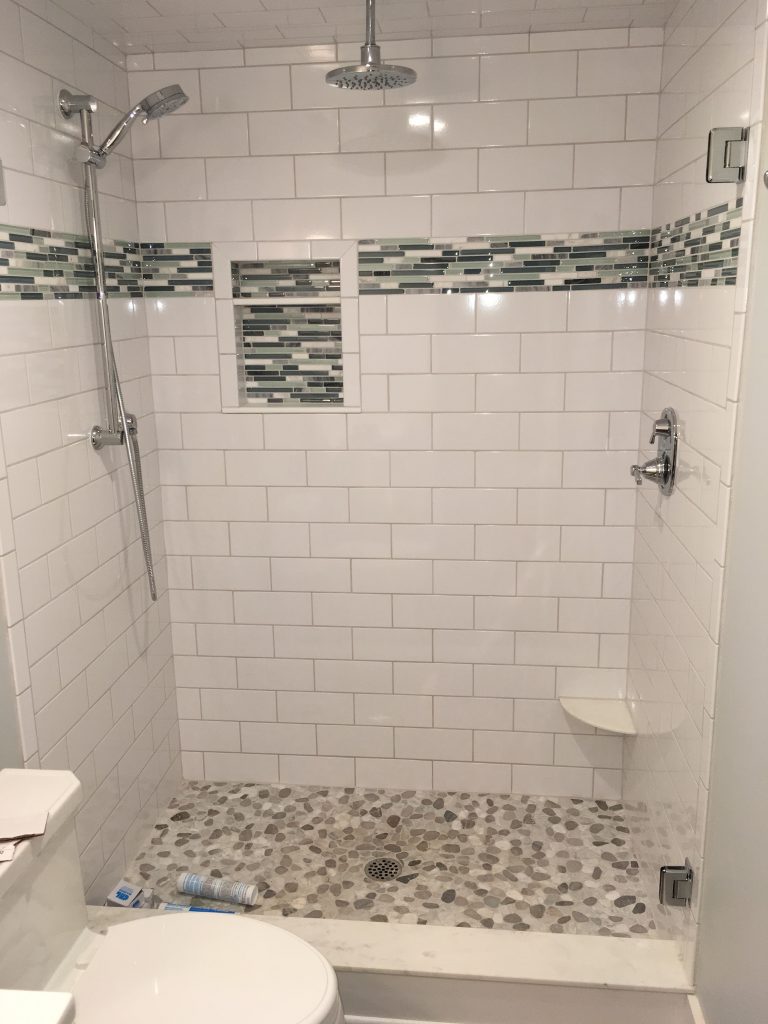 Walk in shower white ceramic tile